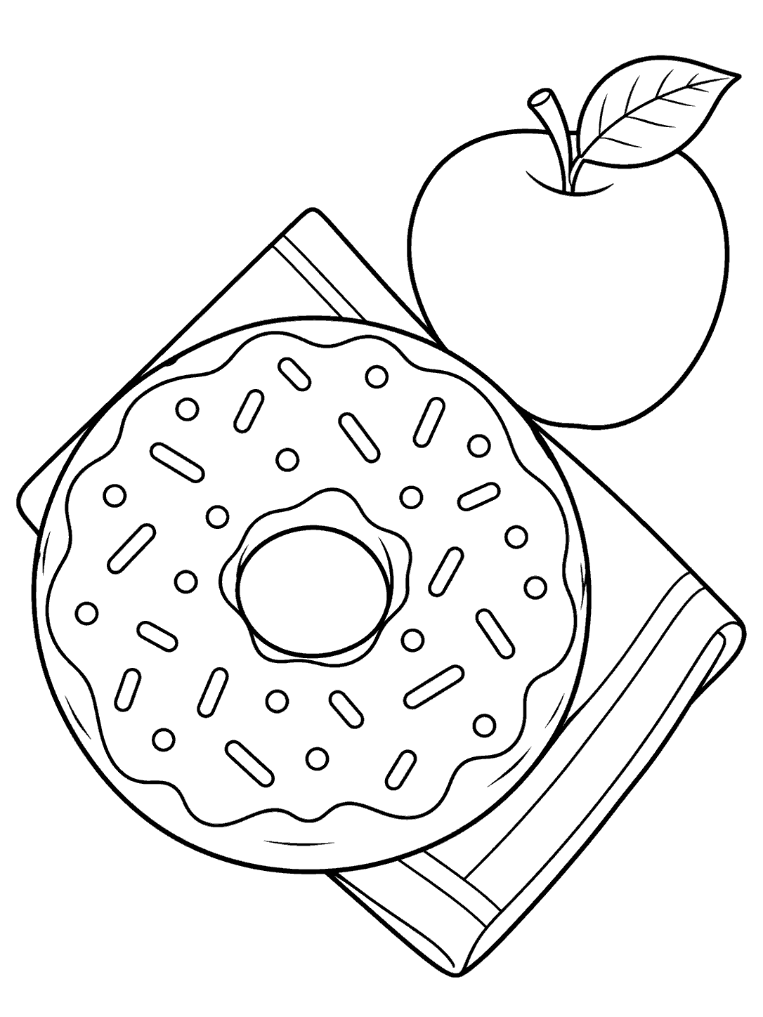 Large sprinkled ring donut on a folded napkin beside a whole apple with a leaf