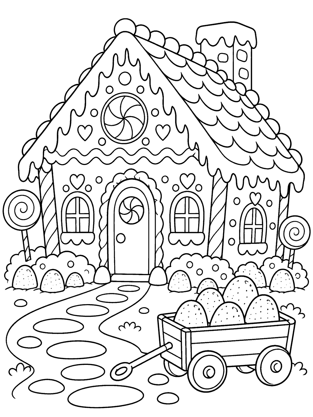 Black-and-white gingerbread cottage with candy trim and a separate two-wheeled wagon filled with gumdrops on the winding path.