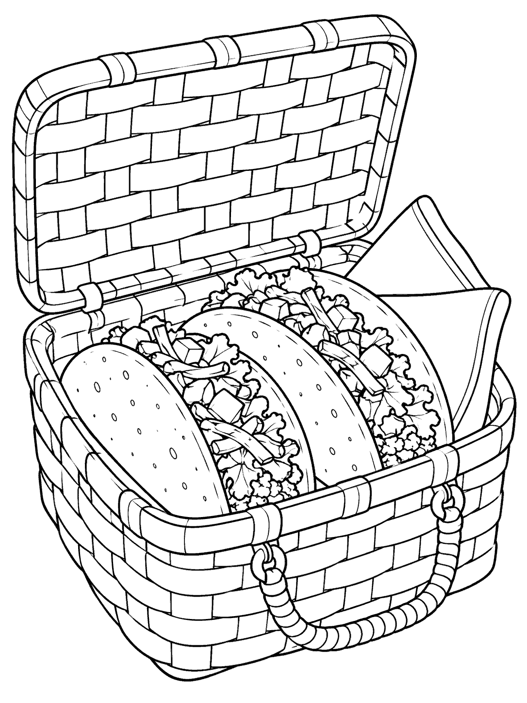 Open woven picnic basket with three tacos and a folded napkin